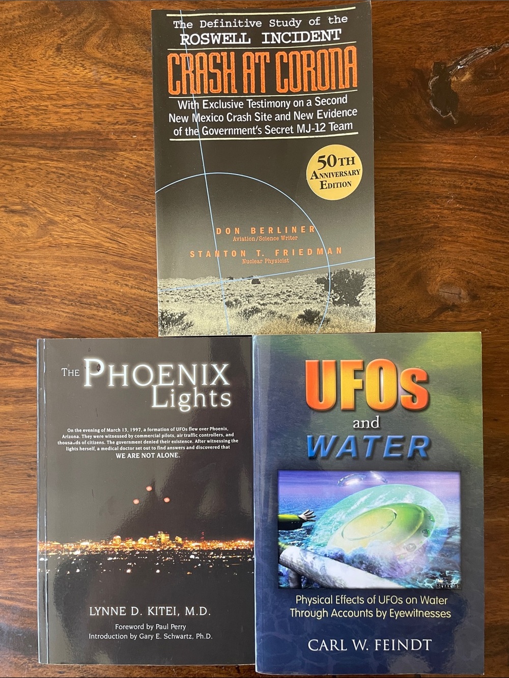 3 UFO Roswell softcover books: Crash at Corona, Phoenix Lights, UFOs and Water